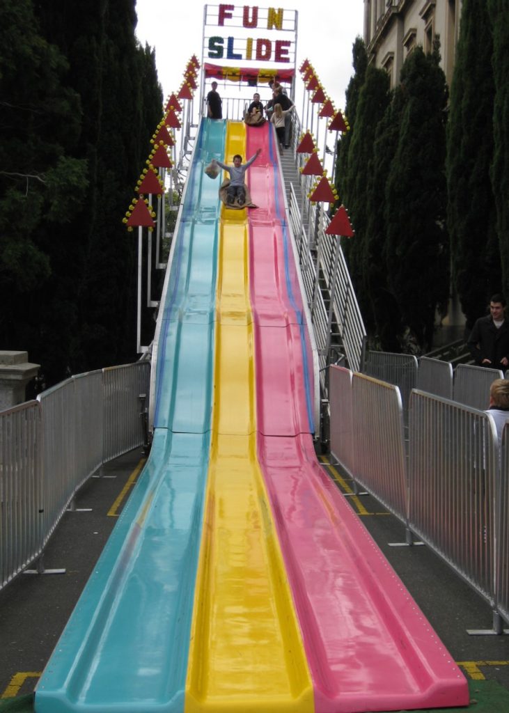 slide with ride on car